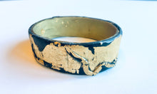 Polymer contemporary bangle in gold and black